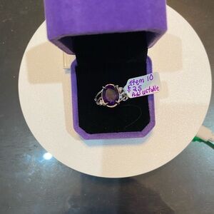 AAA Amethyst oval 10x12 ring. Item 10 Very sparkly.